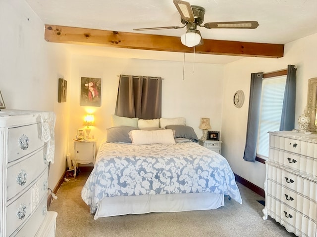 bedroom with beam ceiling, light carpet, and ceiling fan