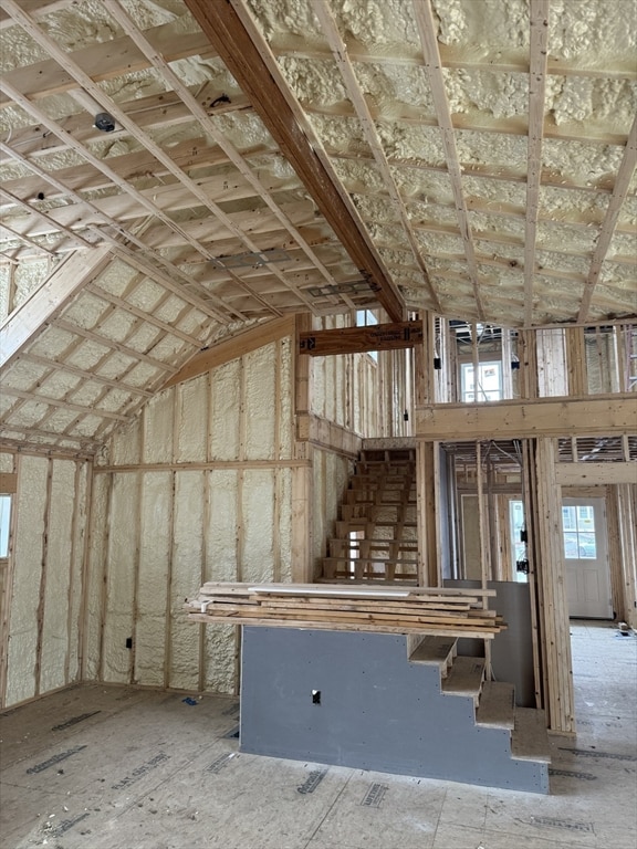 misc room with lofted ceiling