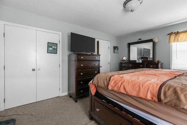 bedroom with light carpet