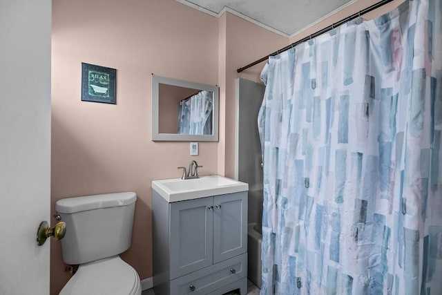 full bathroom with toilet, vanity, and crown molding