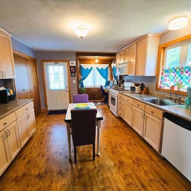 129 Lafayette St, Lowell, MA 01854 - kitchen featuring white appliances, light brown cabinetry, and dark wood-style flooring