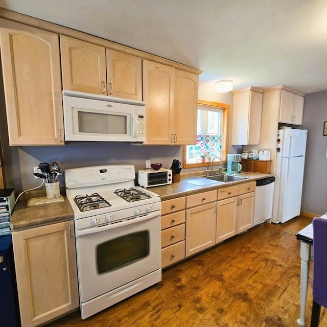 129 Lafayette St, Lowell, MA 01854 - kitchen featuring white appliances, light brown cabinetry, and dark wood finished floors