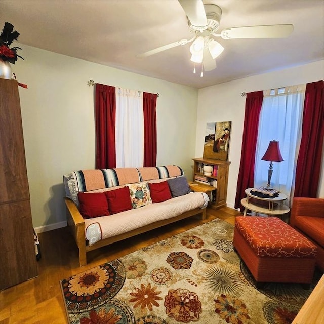 129 Lafayette St, Lowell, MA 01854 - living area featuring wood finished floors and a ceiling fan