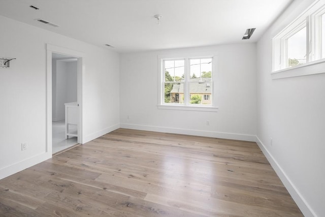 30 Franklin Ave, Oak Bluffs, MA 02557 - empty room with wood finished floors and baseboards