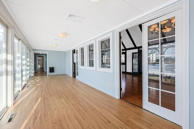 interior space with hardwood / wood-style flooring