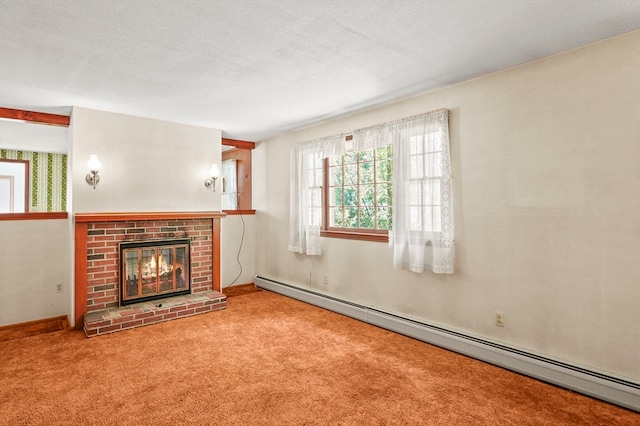 unfurnished living room with carpet flooring, baseboard heating, a textured ceiling, and a brick fireplace