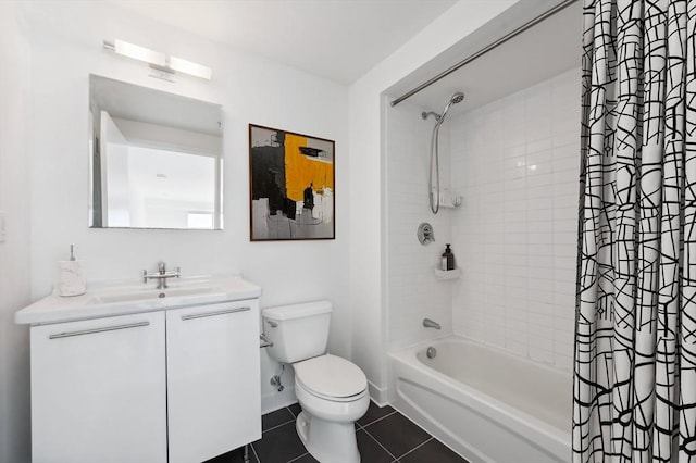 full bathroom featuring shower / bath combo, vanity, toilet, tile patterned floors, and baseboards