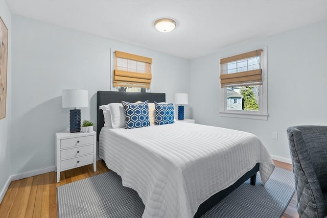 bedroom featuring wood-type flooring