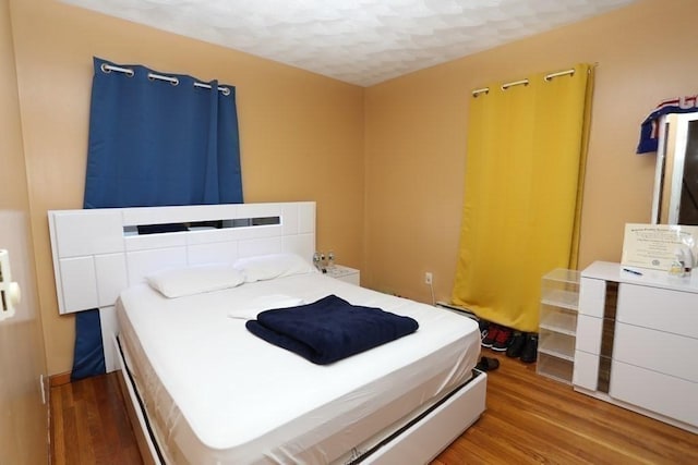 bedroom featuring light hardwood / wood-style floors