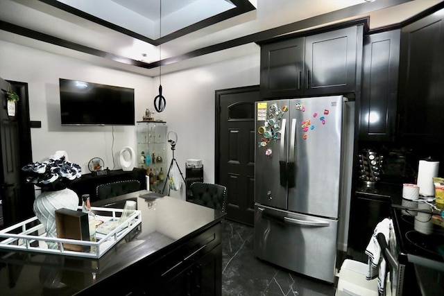 kitchen with range with electric stovetop and stainless steel refrigerator