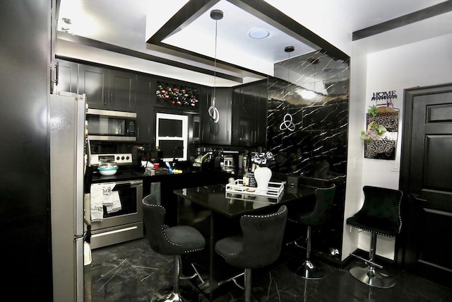 interior space featuring appliances with stainless steel finishes