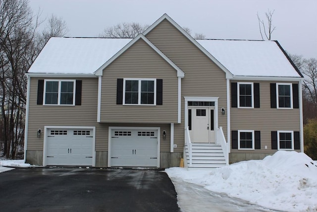 split foyer home featuring a garage