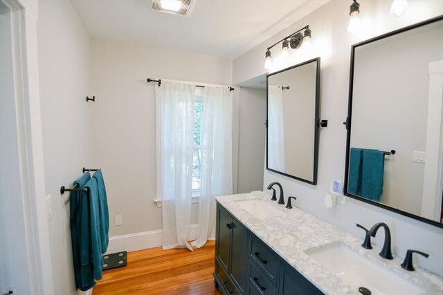 spacious closet featuring light hardwood / wood-style flooring