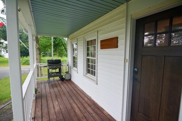 wooden terrace with grilling area