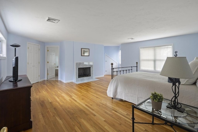 267 Barnes Rd, Oak Bluffs, MA 02557 - bedroom with baseboards, light wood-style floors, and visible vents