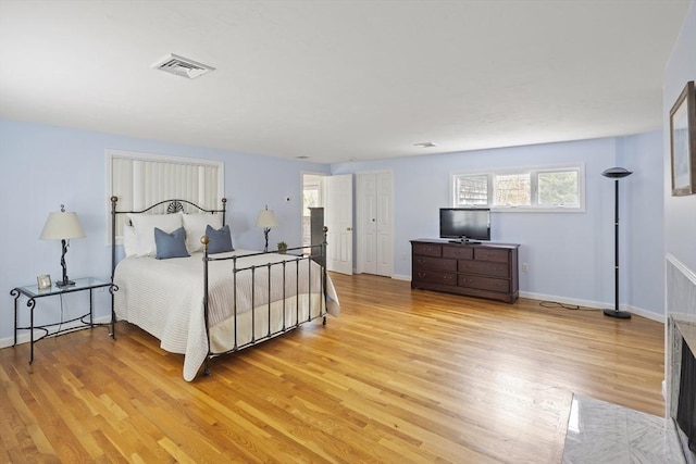 267 Barnes Rd, Oak Bluffs, MA 02557 - bedroom with baseboards, light wood finished floors, and visible vents