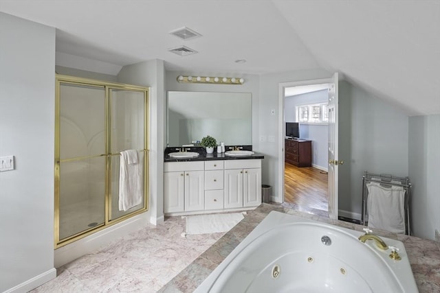 267 Barnes Rd, Oak Bluffs, MA 02557 - full bath featuring a sink, a shower stall, lofted ceiling, and visible vents
