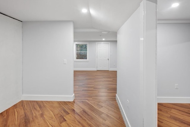 267 Barnes Rd, Oak Bluffs, MA 02557 - interior space with baseboards, wood finished floors, vaulted ceiling, and recessed lighting