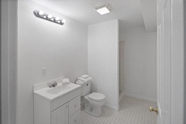 267 Barnes Rd, Oak Bluffs, MA 02557 - full bath featuring visible vents, a shower stall, baseboards, toilet, and vanity