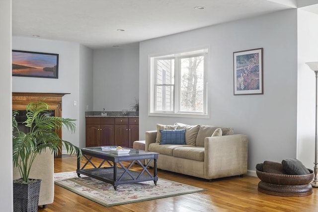 267 Barnes Rd, Oak Bluffs, MA 02557 - living room featuring baseboards, wood finished floors, and recessed lighting