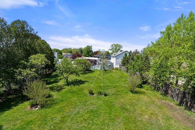 view of yard with fence
