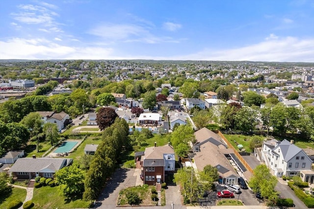 aerial view of residential area with a pool
