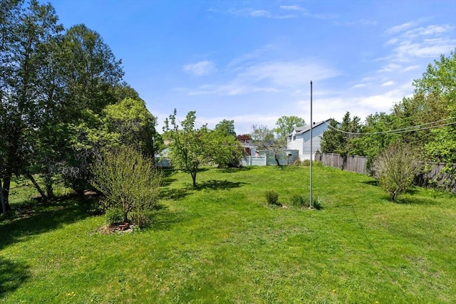 view of yard featuring fence