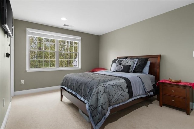 bedroom with light colored carpet, baseboards, visible vents, and recessed lighting
