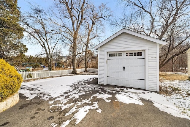 view of snow covered garage