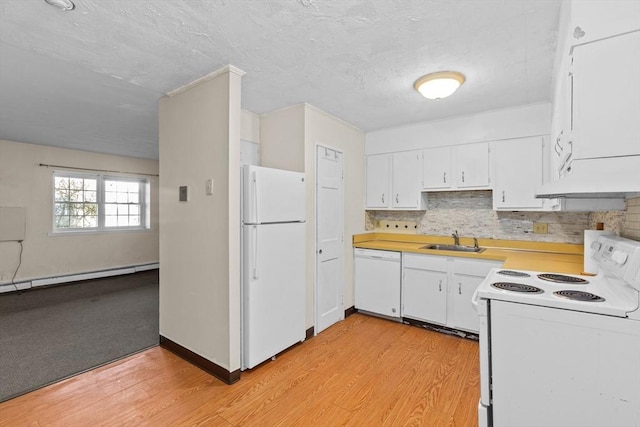 kitchen featuring sink, white appliances, white cabinets, a baseboard radiator, and light wood-type flooring