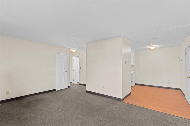 unfurnished room featuring carpet flooring