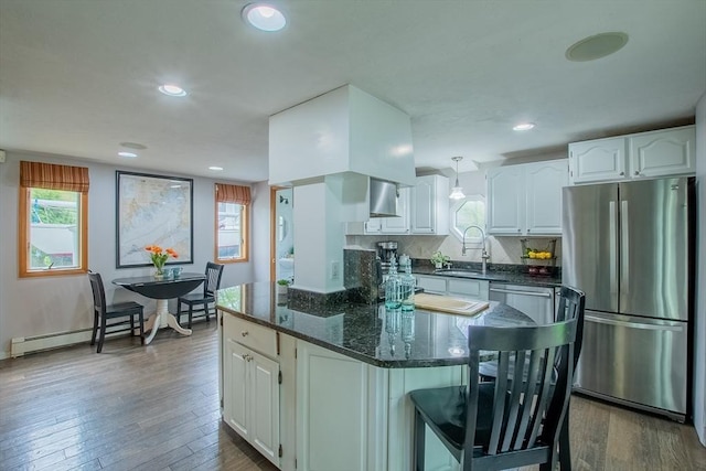 2 Fay Ct, Southborough, MA 01772 - kitchen with freestanding refrigerator, a sink, dark wood-style flooring, white cabinets, and recessed lighting