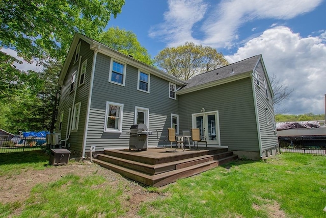 2 Fay Ct, Southborough, MA 01772 - rear view of house featuring a wooden deck and french doors
