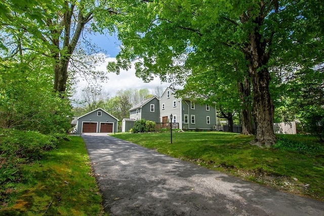 2 Fay Ct, Southborough, MA 01772 - view of front of house featuring a garage and an outbuilding