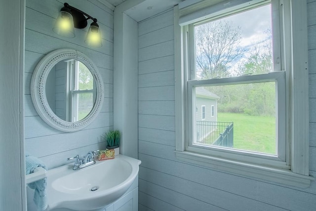 2 Fay Ct, Southborough, MA 01772 - bathroom with a sink and wood walls