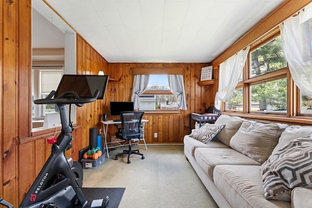 carpeted office with wood walls