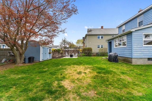 view of yard with a storage unit and an outdoor structure