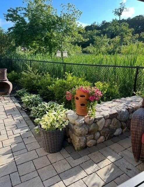 view of yard with a patio and fence
