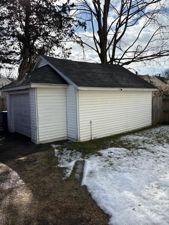 view of snow covered garage