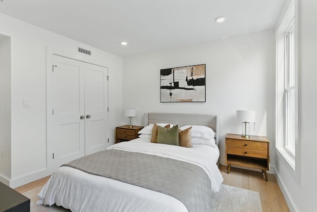 43-45 Wellington St Unit 2, Waltham, MA 02451 - bedroom with light wood-style floors and recessed lighting