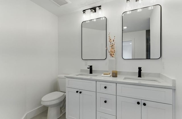 43-45 Wellington St Unit 2, Waltham, MA 02451 - bathroom with double vanity and toilet