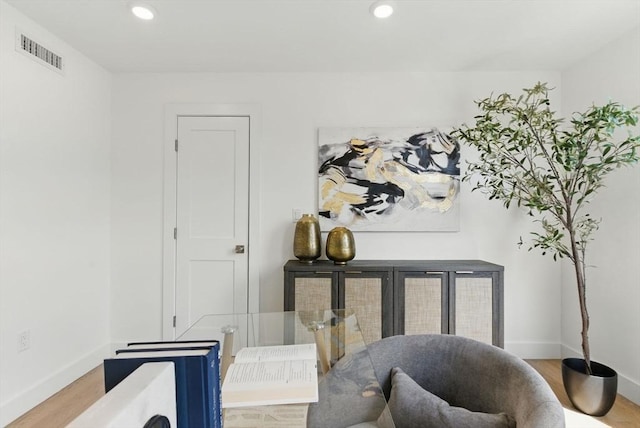 43-45 Wellington St Unit 2, Waltham, MA 02451 - sitting room with wood finished floors and recessed lighting
