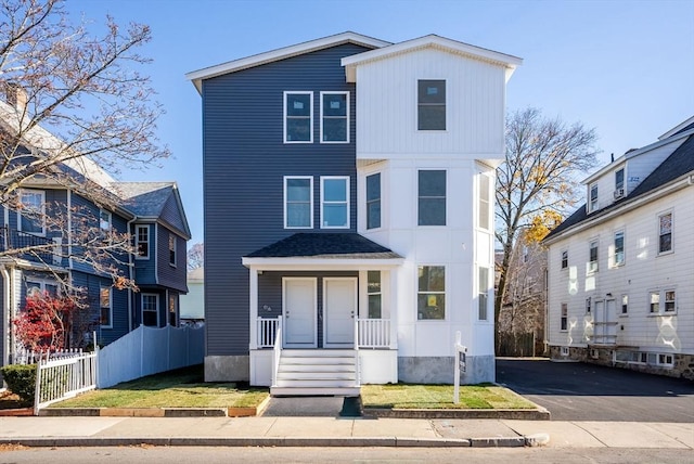 43-45 Wellington St Unit 2, Waltham, MA 02451 - view of front of home featuring covered porch and asphalt driveway