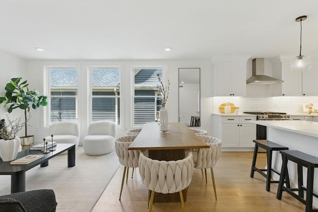 43-45 Wellington St Unit 2, Waltham, MA 02451 - dining area featuring light wood finished floors and recessed lighting