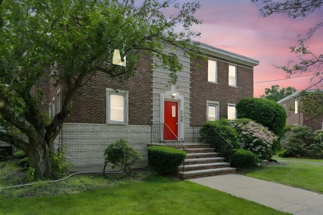 42 Newman Rd Unit 3, Malden, MA 02148 - view of front of property featuring brick siding and a front yard