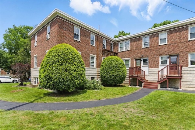 42 Newman Rd Unit 3, Malden, MA 02148 - view of front of property featuring brick siding and a front yard