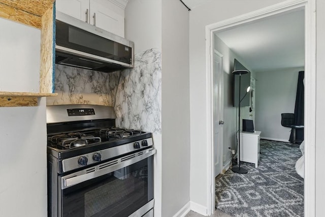 42 Newman Rd Unit 3, Malden, MA 02148 - kitchen featuring appliances with stainless steel finishes and white cabinets