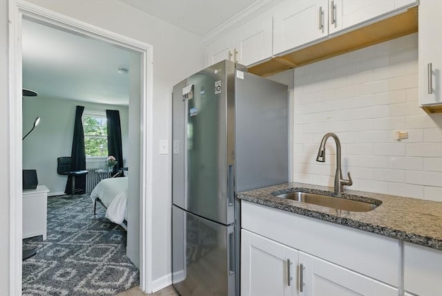 42 Newman Rd Unit 3, Malden, MA 02148 - bathroom featuring decorative backsplash, vanity, and connected bathroom