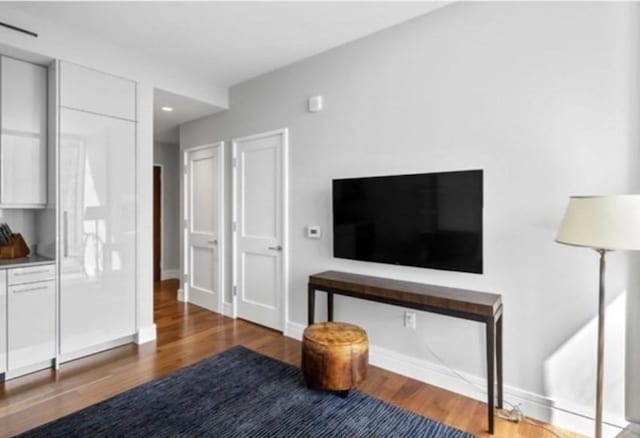 1 Dalton Unit 2410, Boston, MA 02115 - living room featuring baseboards and wood finished floors
