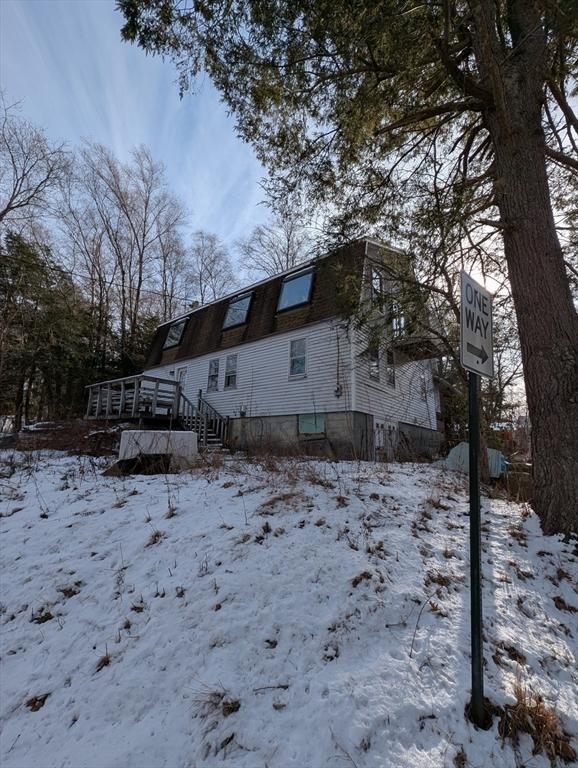 view of snow covered property